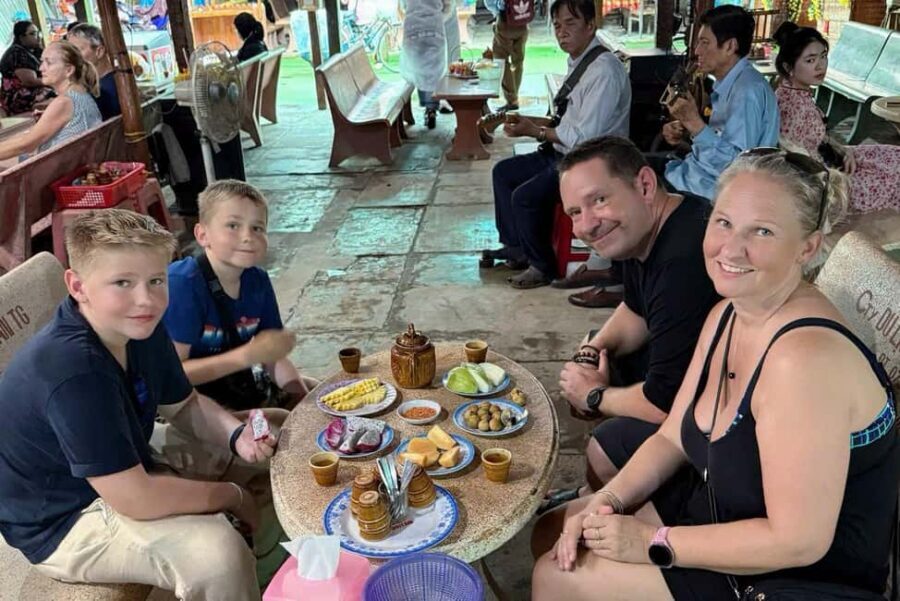 Authentic Mekong Delta: Tuk Tuk, Rowing Boat, Biking Tour - Picking up in District 1 and getting out of the city fast
