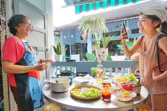 Evening Walking Food Tour, folk game and lantern boat - The folk game moment: bingo or Dap Nieu (and why rain can matter)