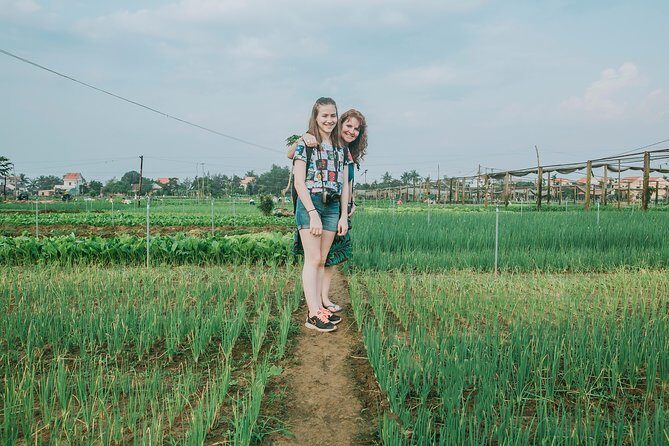 Half-day Hoi An Sunrise Or Sunset Photo Tour - Sunset: Tra Que Village fields and farmers in warm light