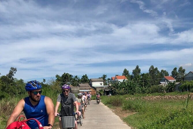 Half-Day My Son Sanctuary Bike Tour from Hoi An - Stop 1: Hoi An riverfront photos, plus an easy way to leave the center behind