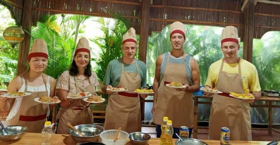 Hoi An: Evening Cooking Class with Locals in Herbs Village - Small-group cooking with an English guide and local chef help