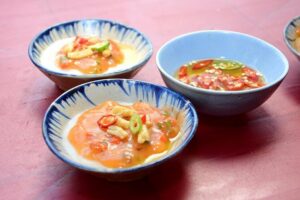 Hoi An Food Tour by Motorbike with Tastings and Dinner - Getting Started: Pickup, Helmets, and the First Snack Run