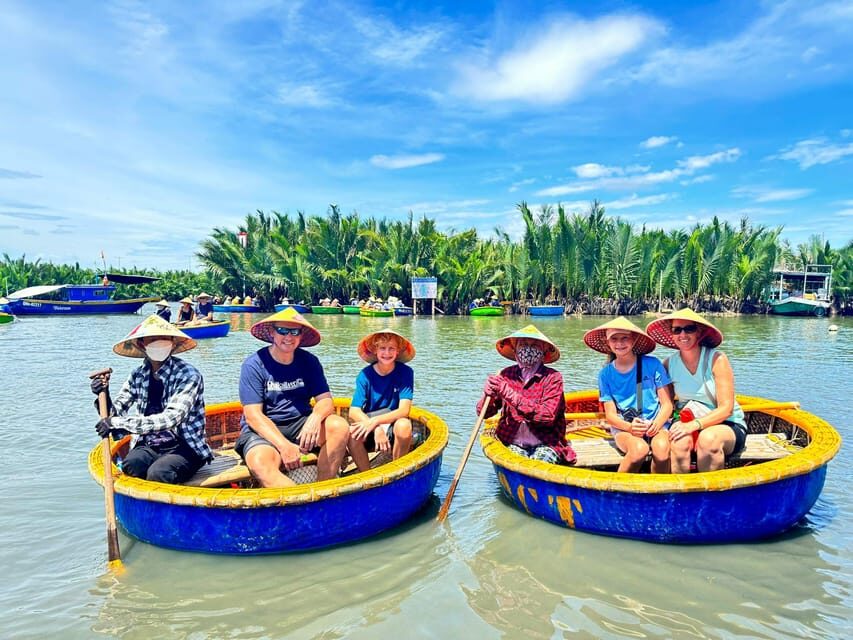 Hoi An: Lady Buddha, Marble Mountains, Coconut & Hoi An Tour - Hoi An Ancient Town: Japanese Bridge, pagodas, and old houses on a guided path