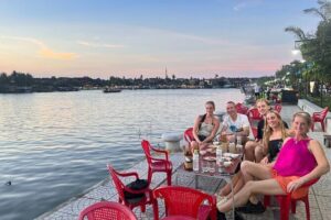 HOI AN Sunset Food Tour - Night Market - Lantern Streets - Meeting at Local Buddy Tours and starting with the river vibe