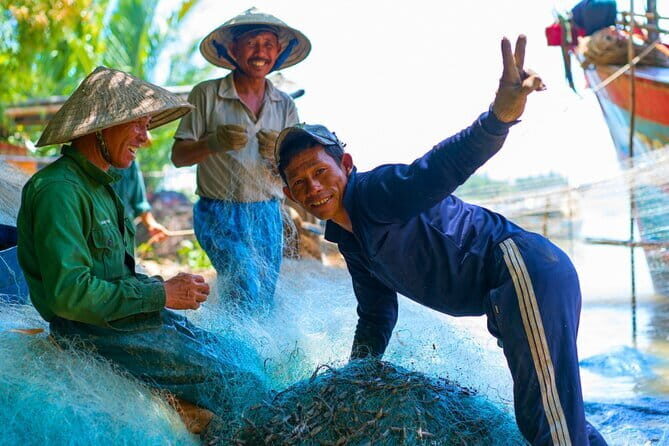 Small Group Bicycle Tour with Farming and Fishing Experience - Hands-on rice farming: ploughing, preparing, and planting baby rice